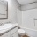 a bathroom with a sink toilet and bathtub